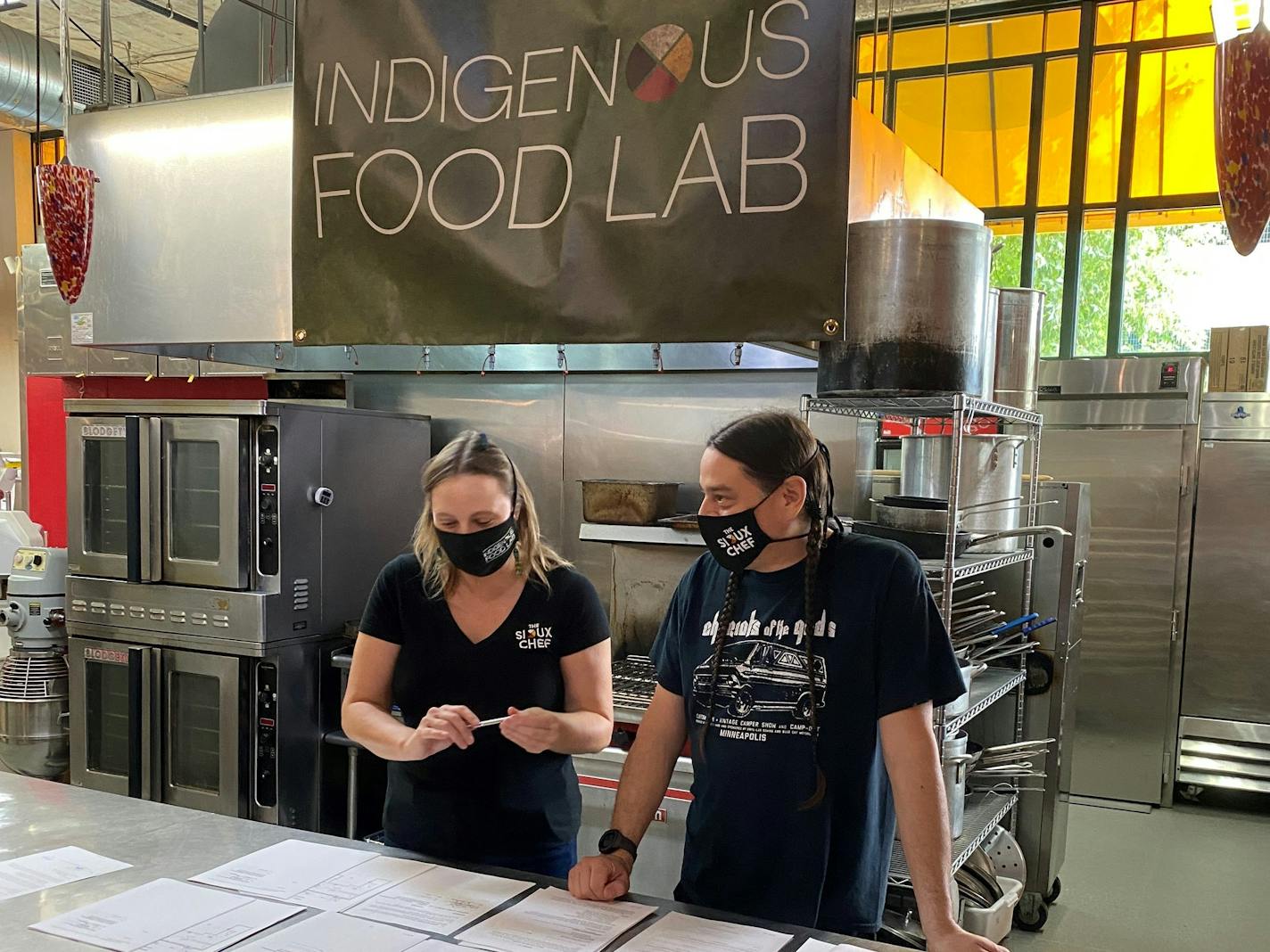 Dana Thompson, owner/COO, and Sean Sherman, founder of the Sioux Chef at the Indigenous Food Lab's new home in Midtown Global Market.