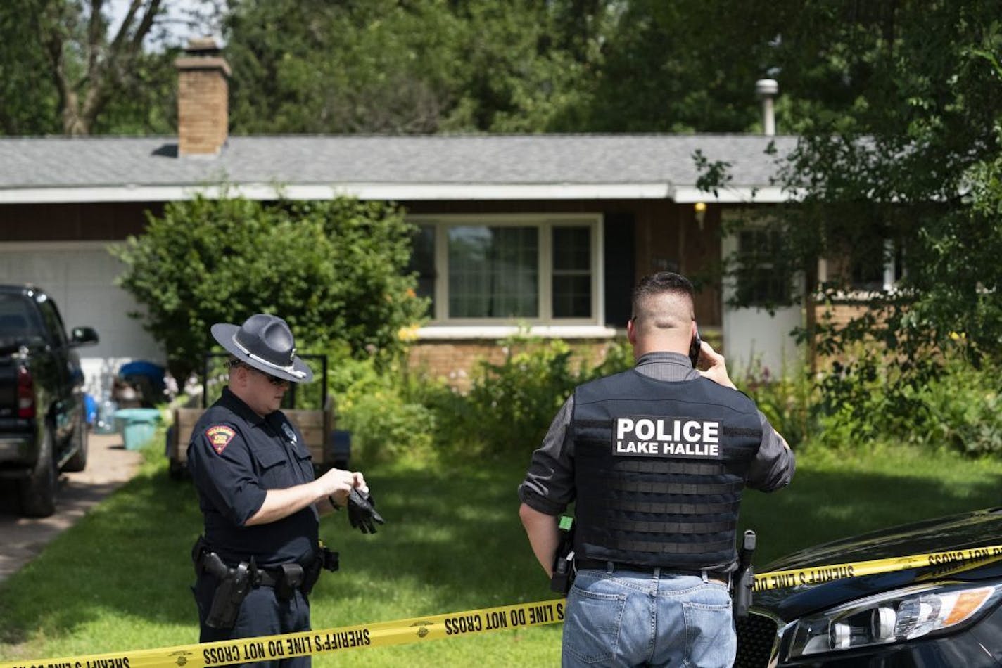 Lake Hallie police and the Wisconsin State Patrol investigated Monday the scene of a shooting that left two dead and two in the hospital. Three people were found dead at another location.