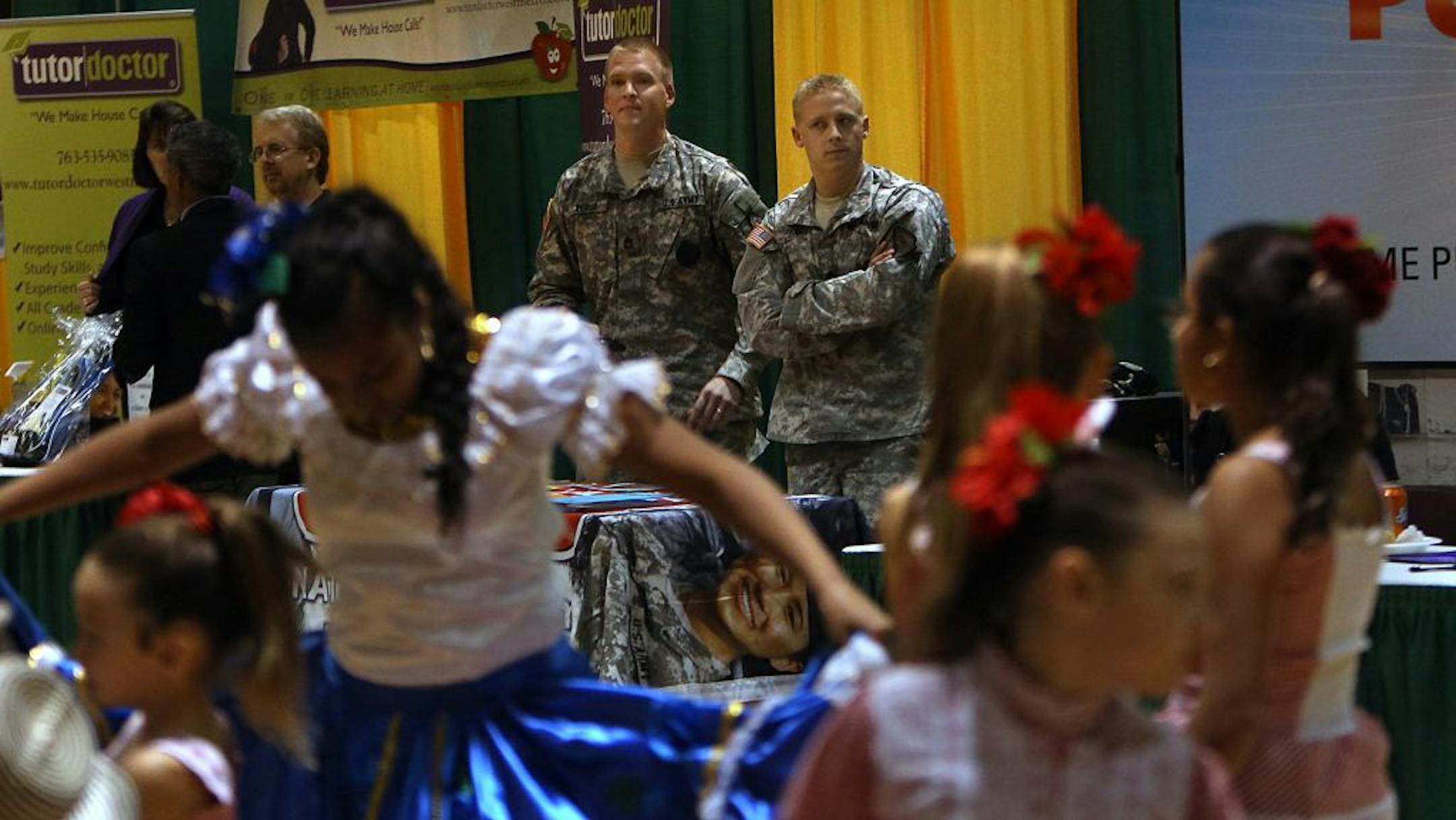 The Minnesota National Guard was represented recently at the La Familia Latino Festival in St. Paul, were SFC Dennis Bebus (left) and SSG Matthew Vilven were on hand to answer questions.