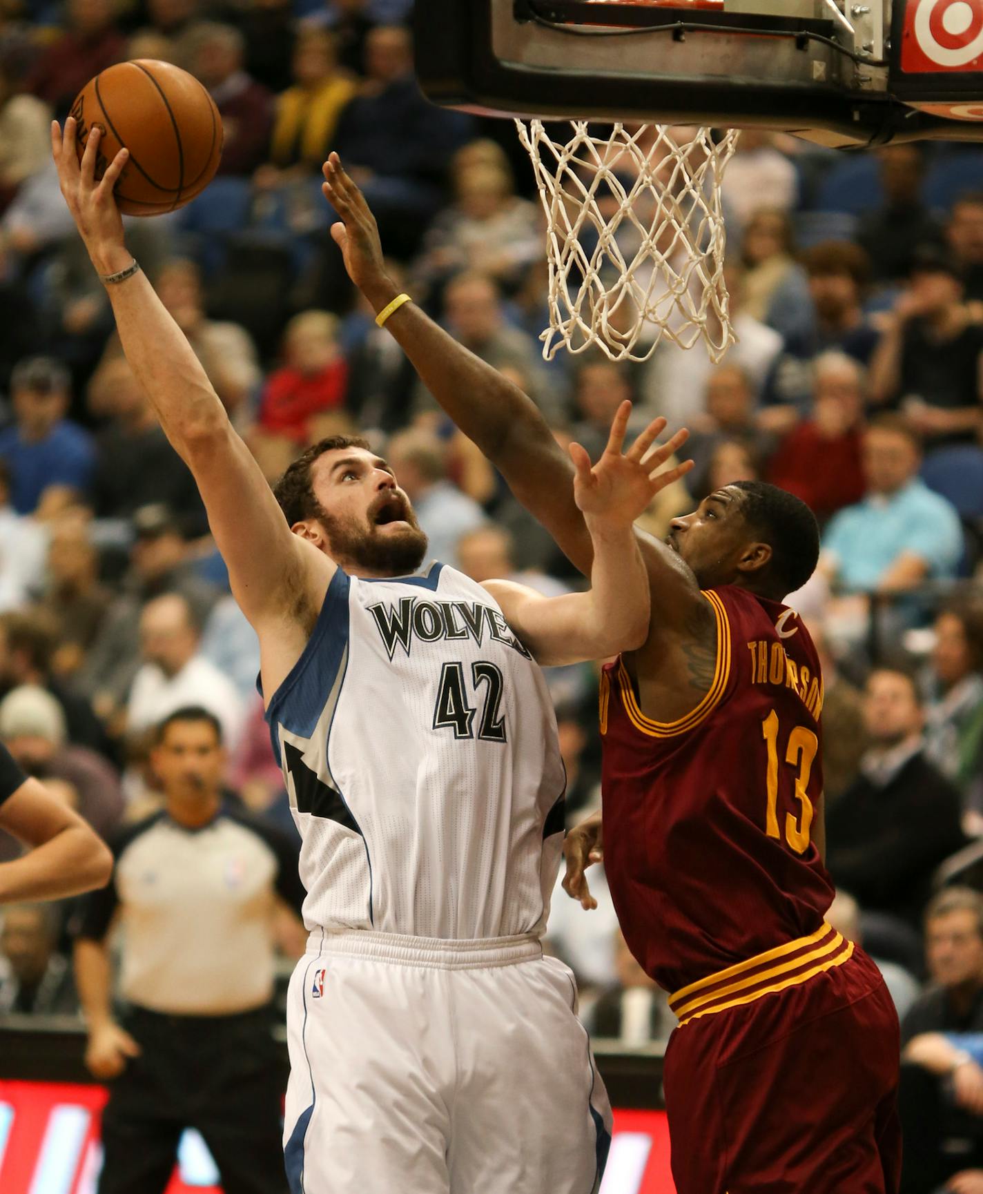 The Minnesota Timberwolves handily beat the Cleveland Cavaliers 124-95 in an NBA game Wednesday night, November 13, 2013 at Target Center in Minneapolis. Minnesota Timberwolves power forward Kevin Love (42) made two of his game high 33 points over the defense of Cleveland Cavaliers power forward Tristan Thompson (13). ] JEFF WHEELER ‚Ä¢ jeff.wheeler@startribune.com