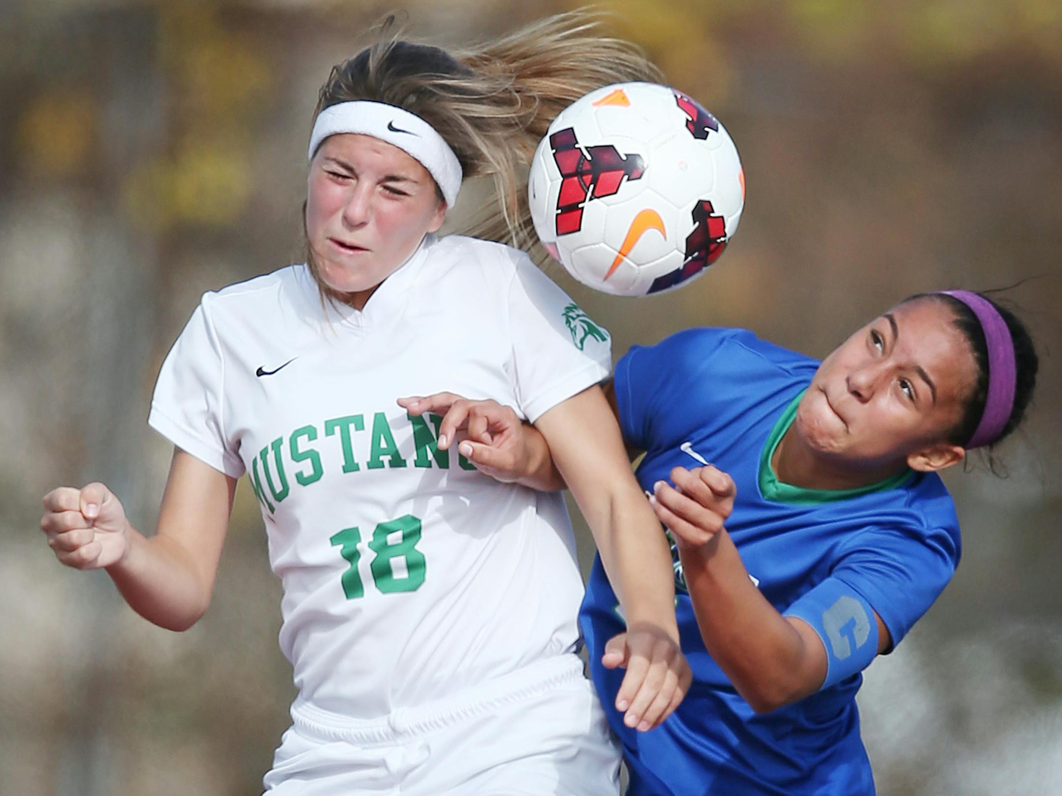 Mounds View Emily Nash left collided with Eagan Jade King in the first half at Husky Stadium November 2, 2015 in St. Cloud, MN. ] Eagan beat Mounds View 4-2 in girlís 2-A semi final action at St. Cloud State University Husky Stadium. Jerry Holt/ Jerry.Holt@Startribune.com