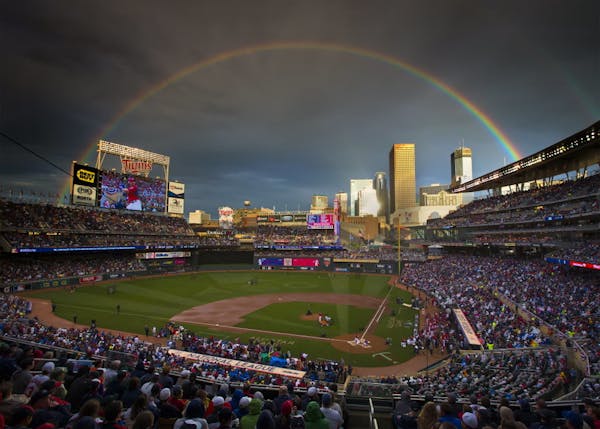 A rainbow shows over Target Field during the 2014 All-Star Game.