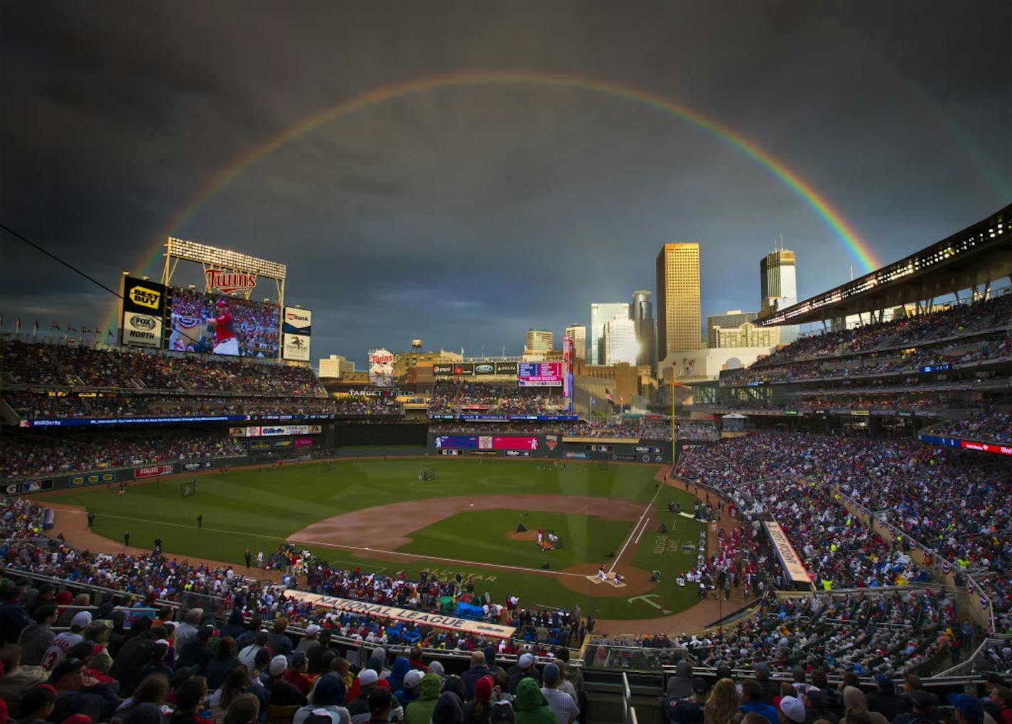 A rainbow shows over Target Field during the 2014 All-Star Game.