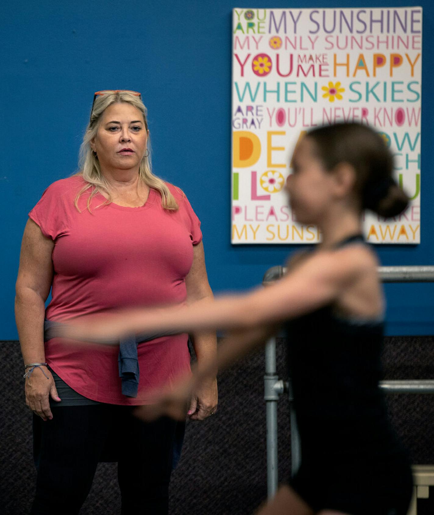 Even as she struggles with worry and working to find ways to keep her school going, Jeanne Johnson continues teaching classes at the school she opened 16 years ago.