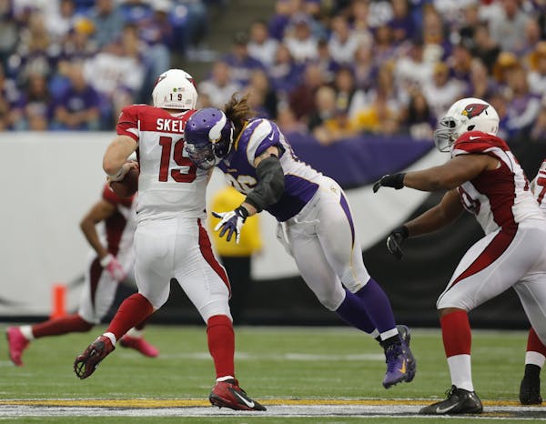 . Cardinals' quarterback John Skelton was sacked for a nine yard loss by the Vikings' Brian Robison in the fourth quarter.