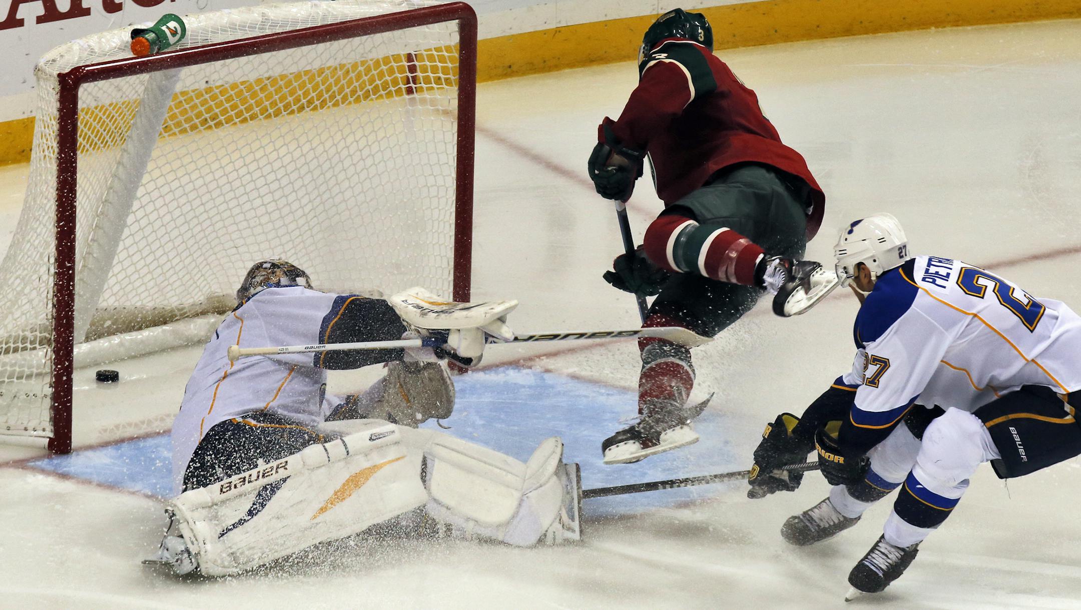 Minnesota Wild vs. St. Louis Blues hockey. wild won 3-1. Wild's Charlie Coyle flew past the net as he scored a 3rd period goal. (MARLIN LEVISON/STARTRIBUNE(mlevison@startribune.com)