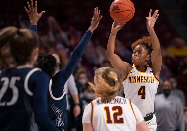 Minnesota Gophers guard Jasmine Powell (4) shot over Penn State Lady Lions guard Shay Hagans (23) in the fourth quarter. Powell led the Gophers with 1
