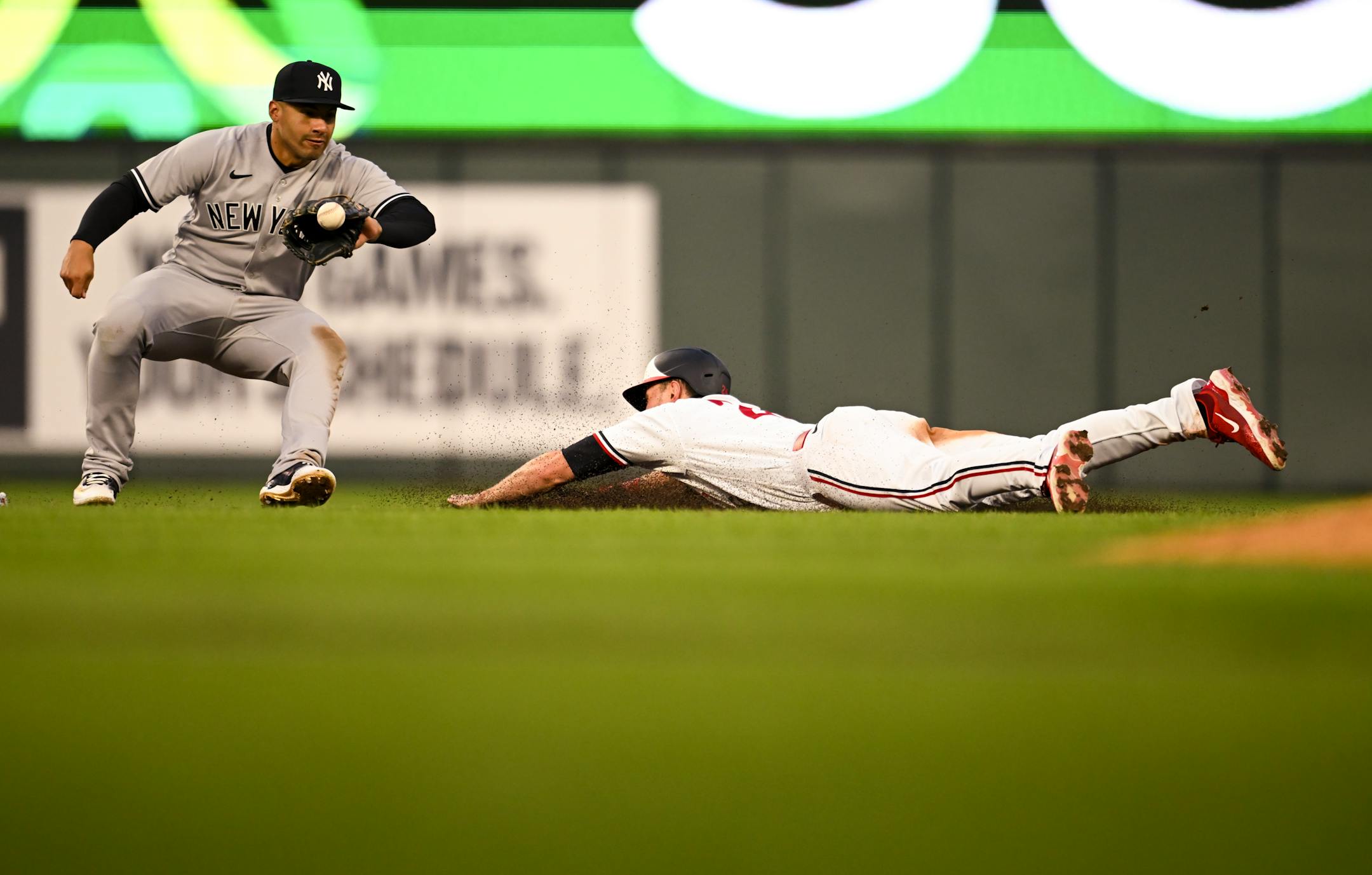Minnesota Twins right fielder Max Kepler is caught stealing second in the bottom of the fourth inning as New York Yankees second baseman Gleyber Torres makes the play.