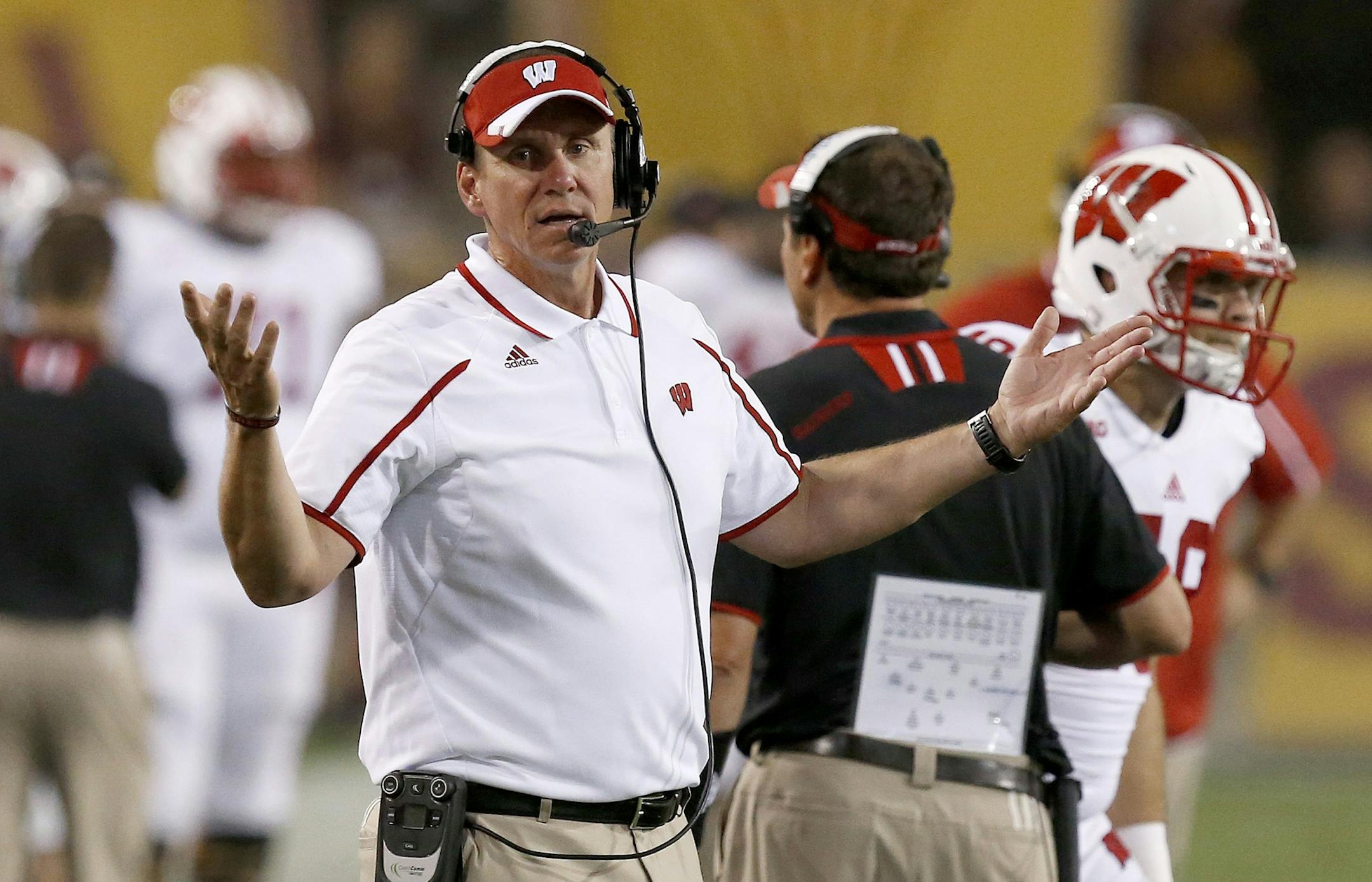 Wisconsin head coach Gary Andersen complains to officials during the second half in an NCAA college football game against Arizona State on Saturday, Sept. 14, 2013, in Tempe, Ariz. Arizona State defeated Wisconsin 32-30. (AP Photo/Ross D. Franklin) ORG XMIT: RFOTK224