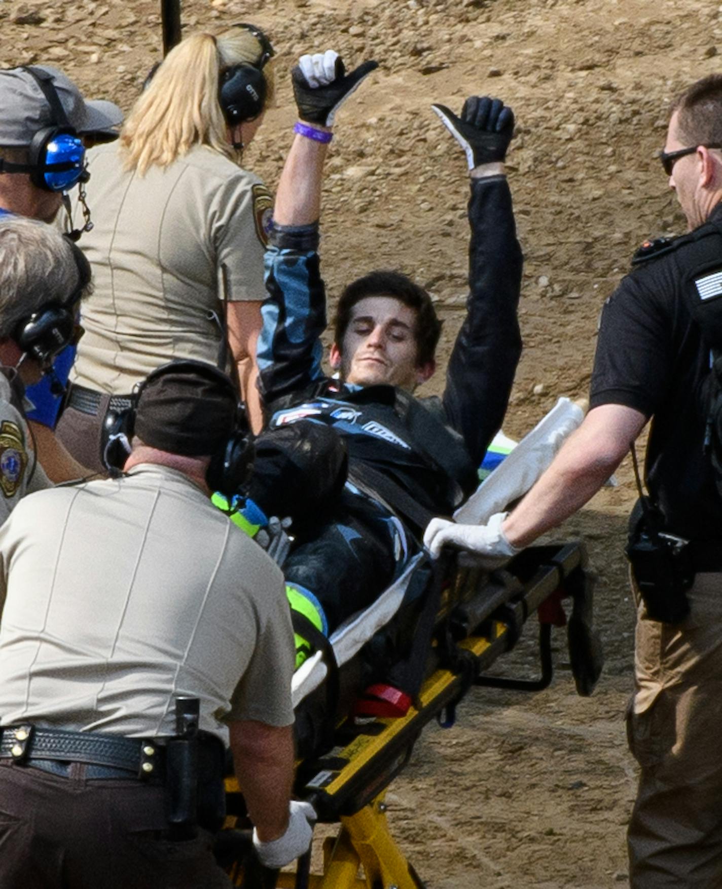 Jarryd McNeil gestured to fans as he was carted off the dirt after a bad fall in the motocross quarter pipe high air final. ] AARON LAVINSKY &#xef; aaron.lavinsky@startribune.com The X Games were held Sunday, July 16, 2017 at US Bank Stadium in Minneapolis, Minn.