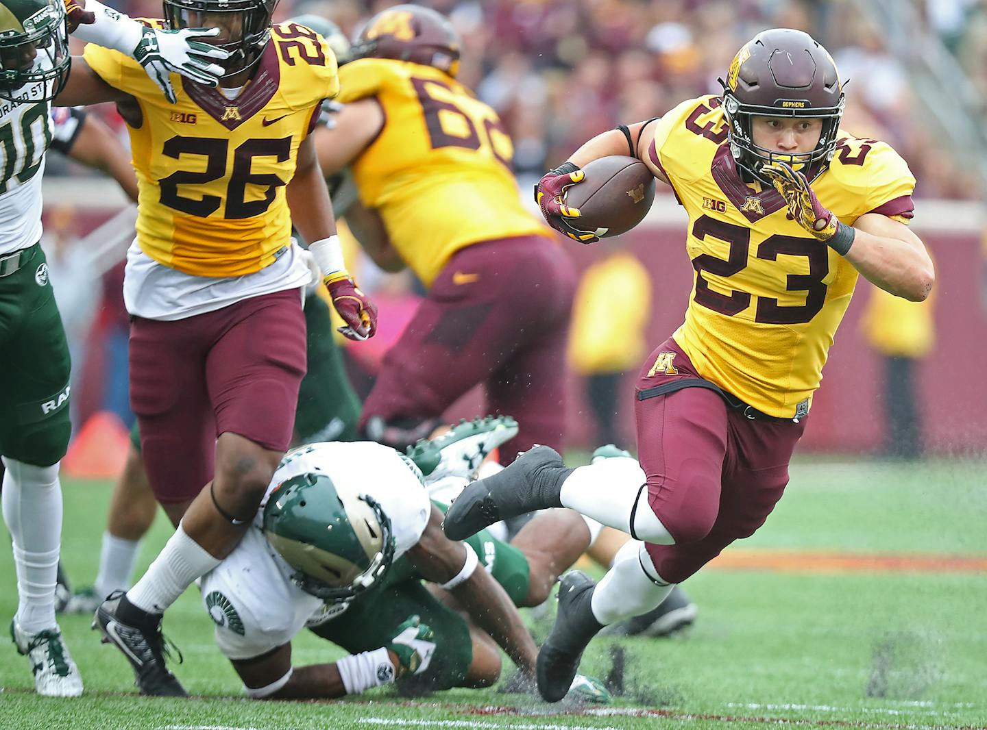 Minnesota's running back Shannon Brooks ran for a first down in the third quarter Saturday against Colorado State