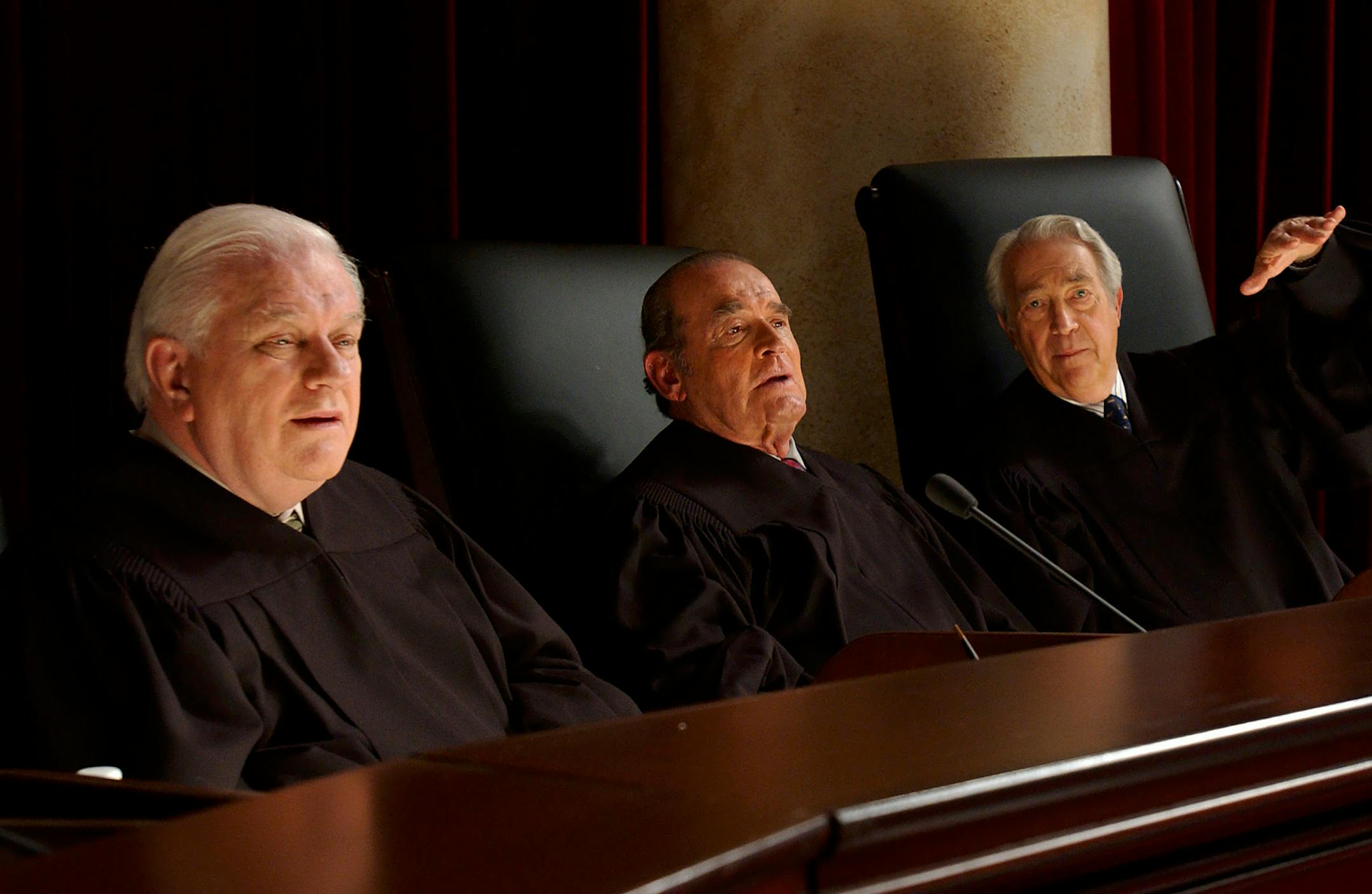 FILE - In this Dec. 11, 2001 file photo, actors Charles Durning, left, James Garner, center, and James Karen rehearse on the set of "First Monday" at the Sunset Gower Studios in Los Angeles. Durning, the two-time Oscar nominee who was dubbed the king of the character actors for his skill in playing everything from a Nazi colonel to the pope, died Monday, Dec. 24, 2012 at his home in New York City. He was 89. (AP Photo/Lucy Nicholson)