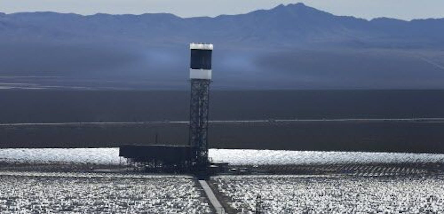 FILE - This Feb. 11, 2014 file photo shows some of the 300,000 computer-controlled mirrors, at the Ivanpah Solar ElectirIc Generating System in Primm, Nev.