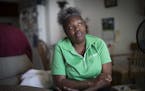 Michelle Washington relies on an average $300 PayDay loan every two weeks to pay her bills. She was photographed at home on Thursday, July 29, 2015, i