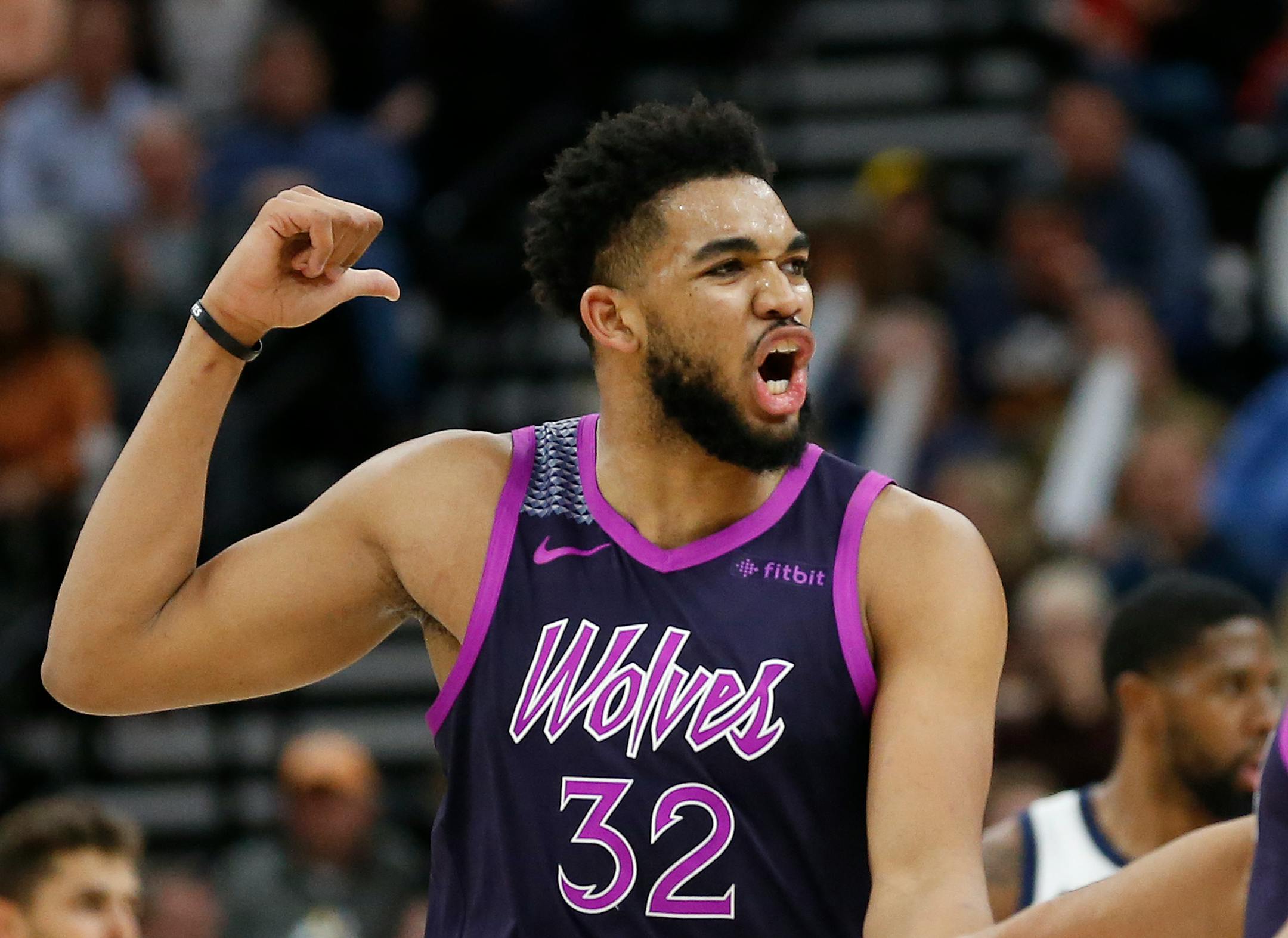 Timberwolves center Karl-Anthony Towns reacts after being called for a foul during the second half