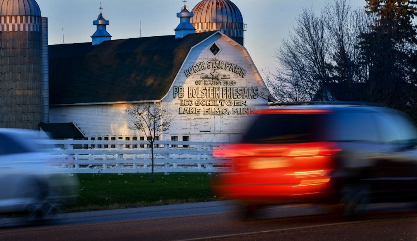 Evening commuters along Stillwater Blvd pass by North Star Farm at the edge of Lake Elmo.