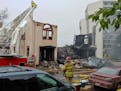 An overnight fire engulfed and destroyed a synagogue in downtown Duluth and continued to burn many hours later Monday morning.