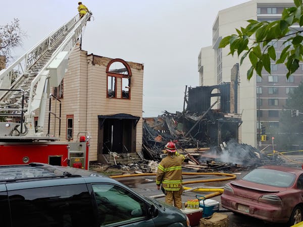 An overnight fire engulfed and destroyed a synagogue in downtown Duluth and continued to burn many hours later Monday morning.