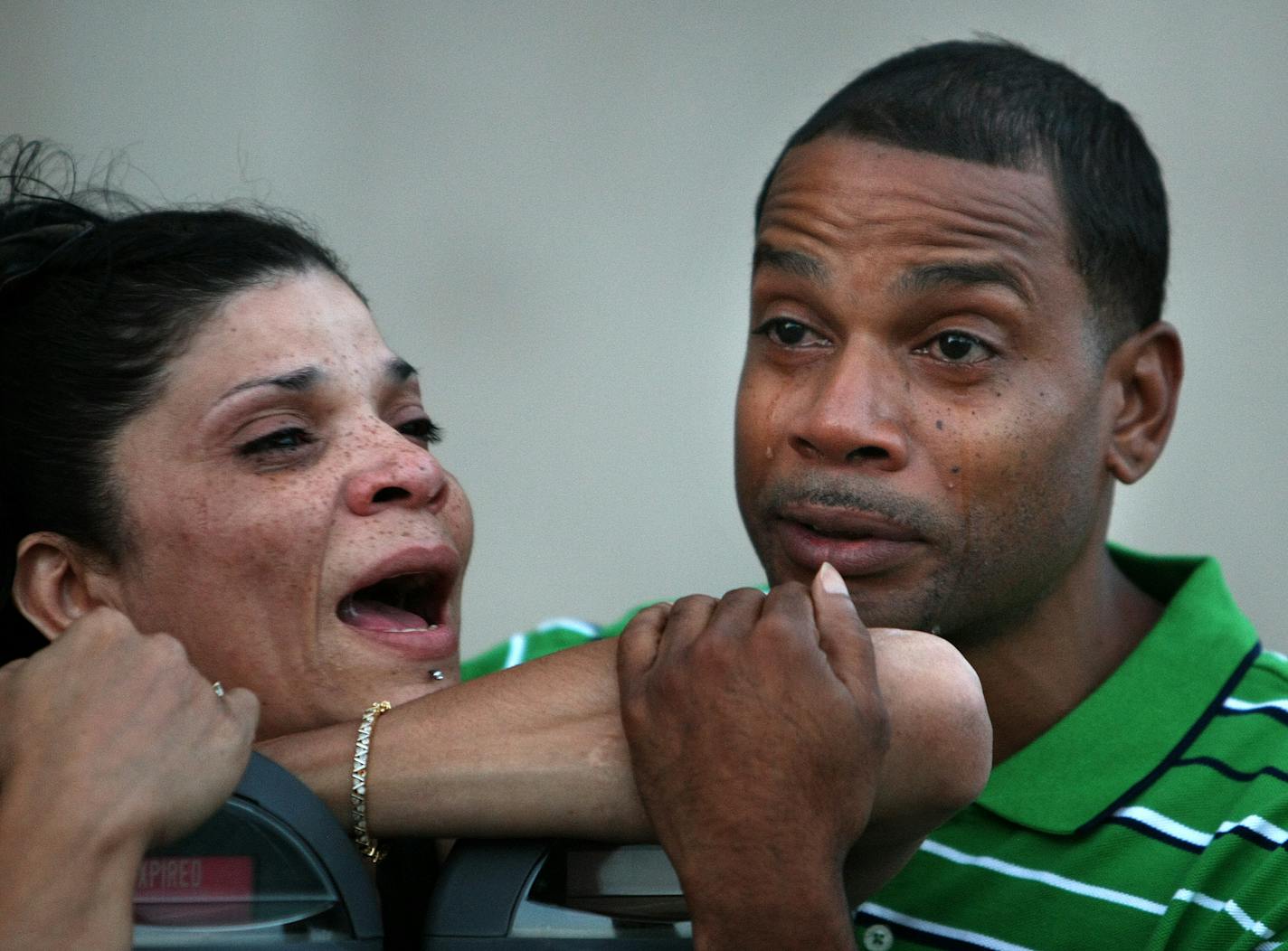 Relatives of Barbara (Bobbi) Winn shouted and cried after a Ramsey County jury found Aaron W. Foster not guilty of third-degree murder on Wednesday. Niece Ginger Halliburton, left, and Tyrone Winn, the youngest of Winn's three children, comforted each other outside the courthouse.