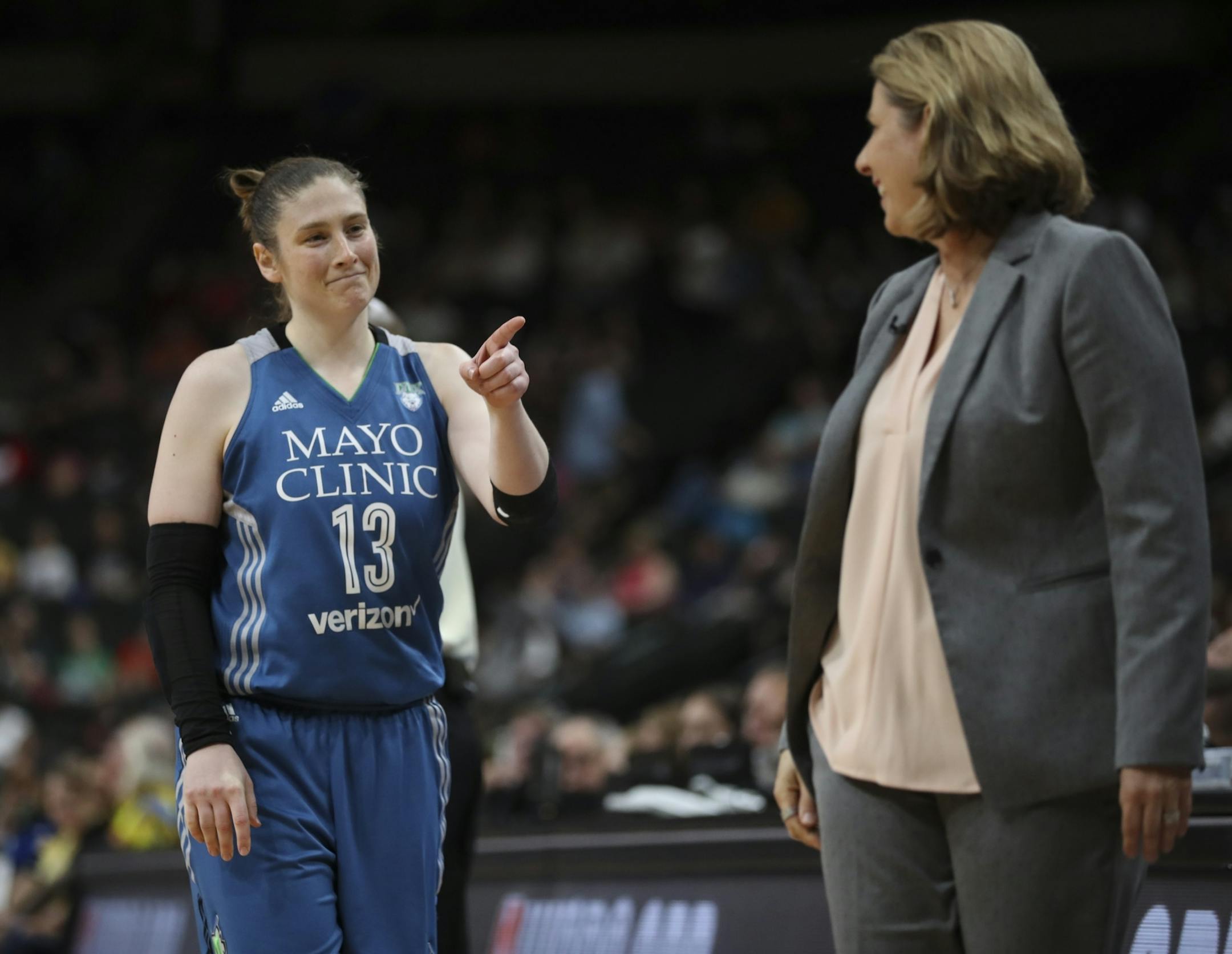 Minnesota Lynx guard Lindsay Whalen (13) made a point with head coach Cheryl Reeve after they consulted in the first half