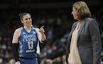 Minnesota Lynx guard Lindsay Whalen (13) made a point with head coach Cheryl Reeve after they consulted in the first half
