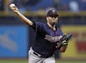 Minnesota Twins starting pitcher Lance Lynn delivers to the Tampa Bay Rays during the first inning of a baseball game Friday, April 20, 2018, in St. P