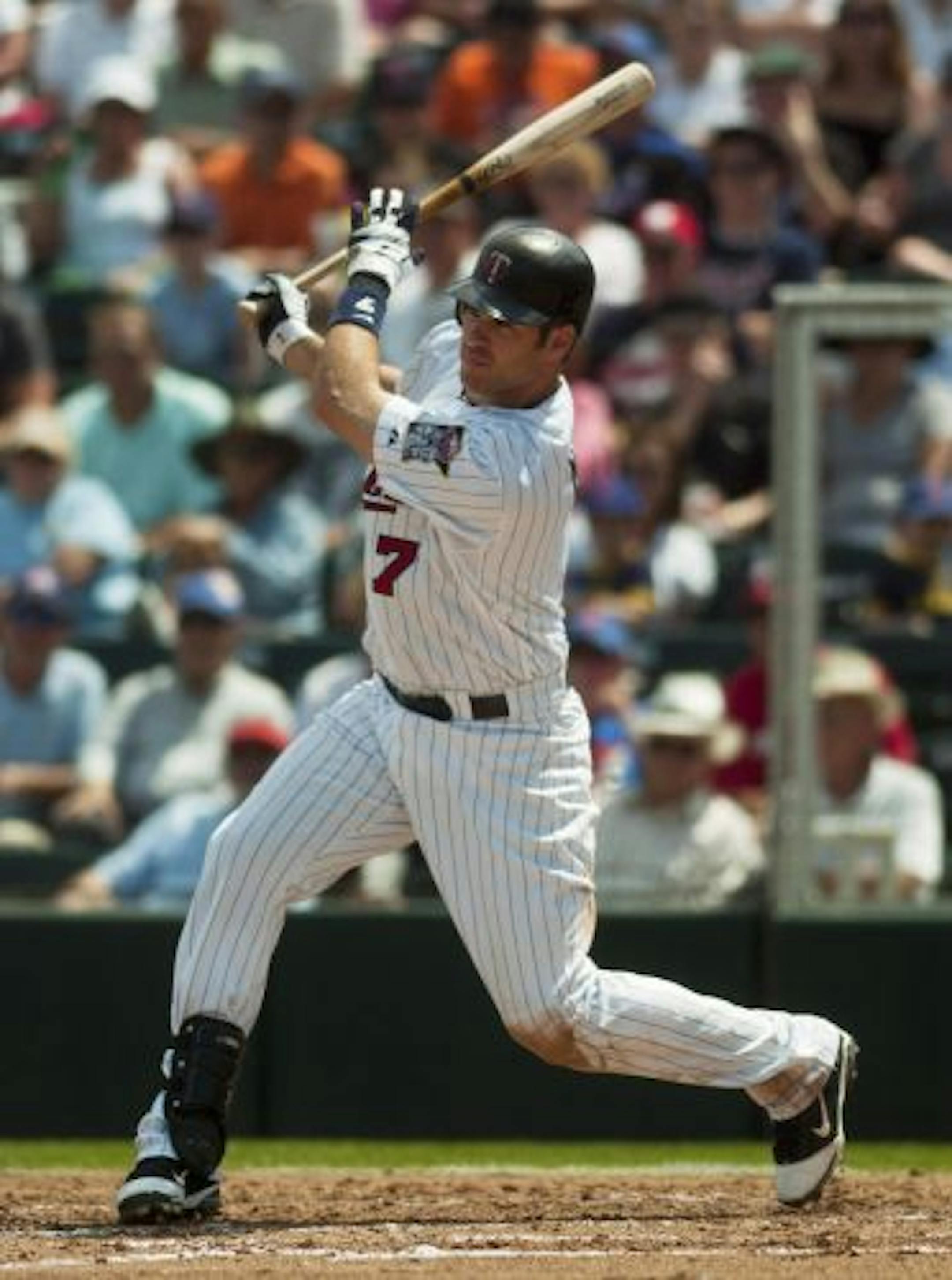 Joe Mauer played his first spring training game Wednesday, going 1-for-3 as the designated hitter.