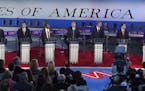 Republican presidential candidates, from left, former Arkansas Gov. Mike Huckabee, Sen. Marco Rubio, R-Fla., Sen. Ted Cruz, R-Texas, retired neurosurg