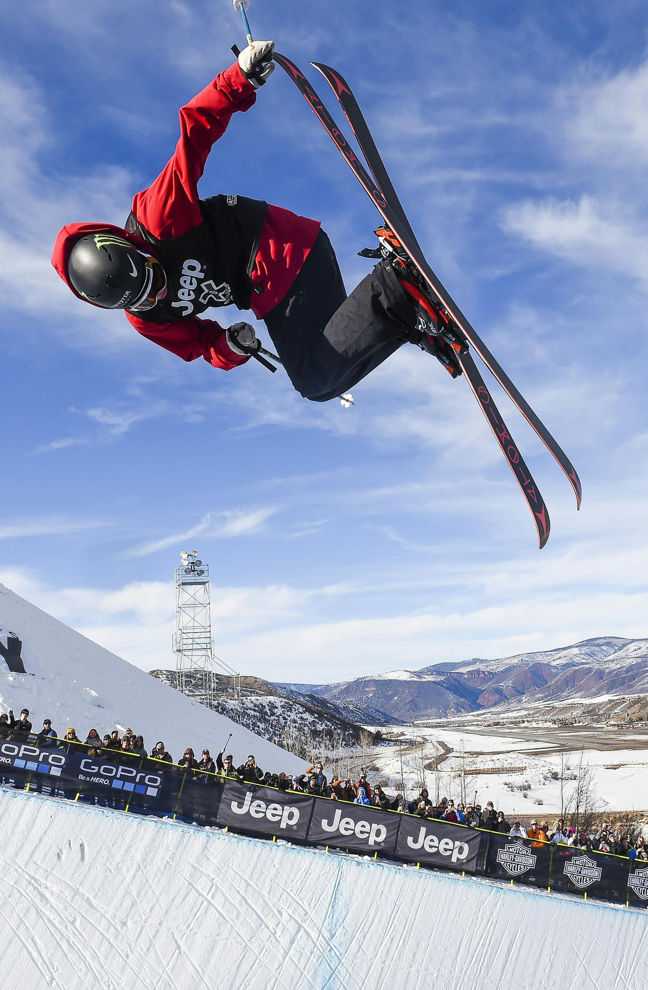 Gus Kenworthy hits a jump off the halfpipe during the Men's Ski Superpipe finals during the final day of the X Games Sunday, Jan. 25, 2015, at Buttermilk Mountain in Aspen, Colo. Kenworthy finished fifth with a score of 88.00. (AP Photo/The Gazette, Michael CIaglo) MAGS OUT