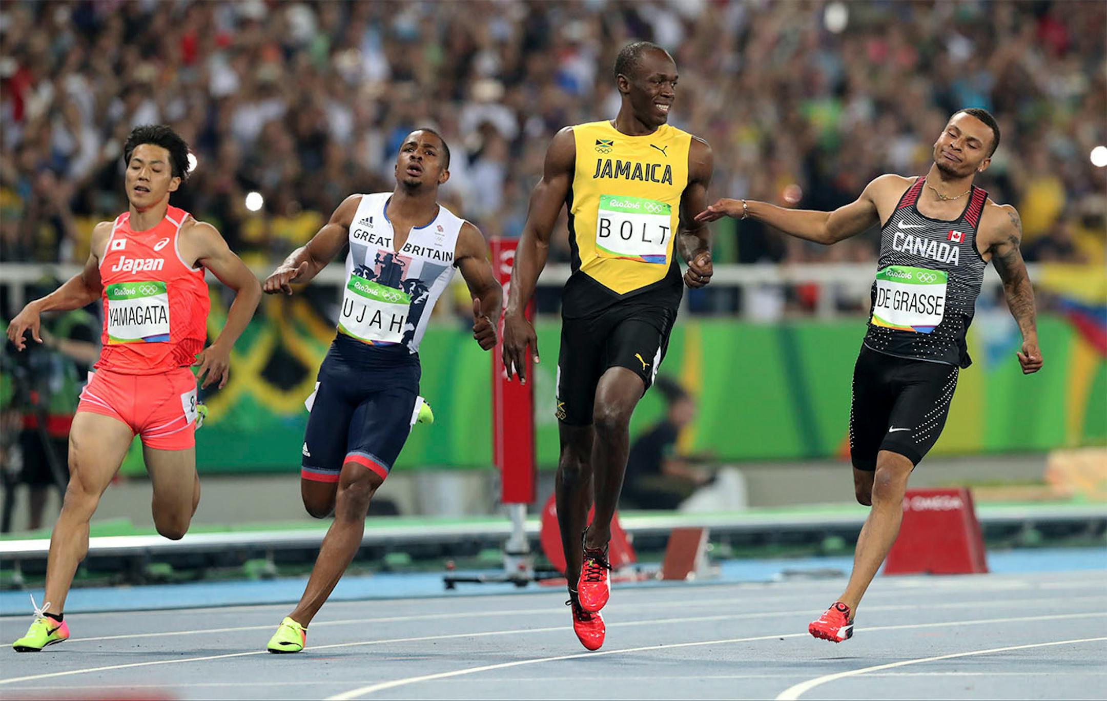 Japan's Ryota Yamagata, Britain's Daniel Talbot, Jamaica's Usain Bolt and Canada's Andre De Grasse compete in a men's 100-meter semifinal during the athletics competitions of the 2016 Summer Olympics at the Olympic stadium in Rio de Janeiro, Brazil, Sunday, Aug. 14, 2016.