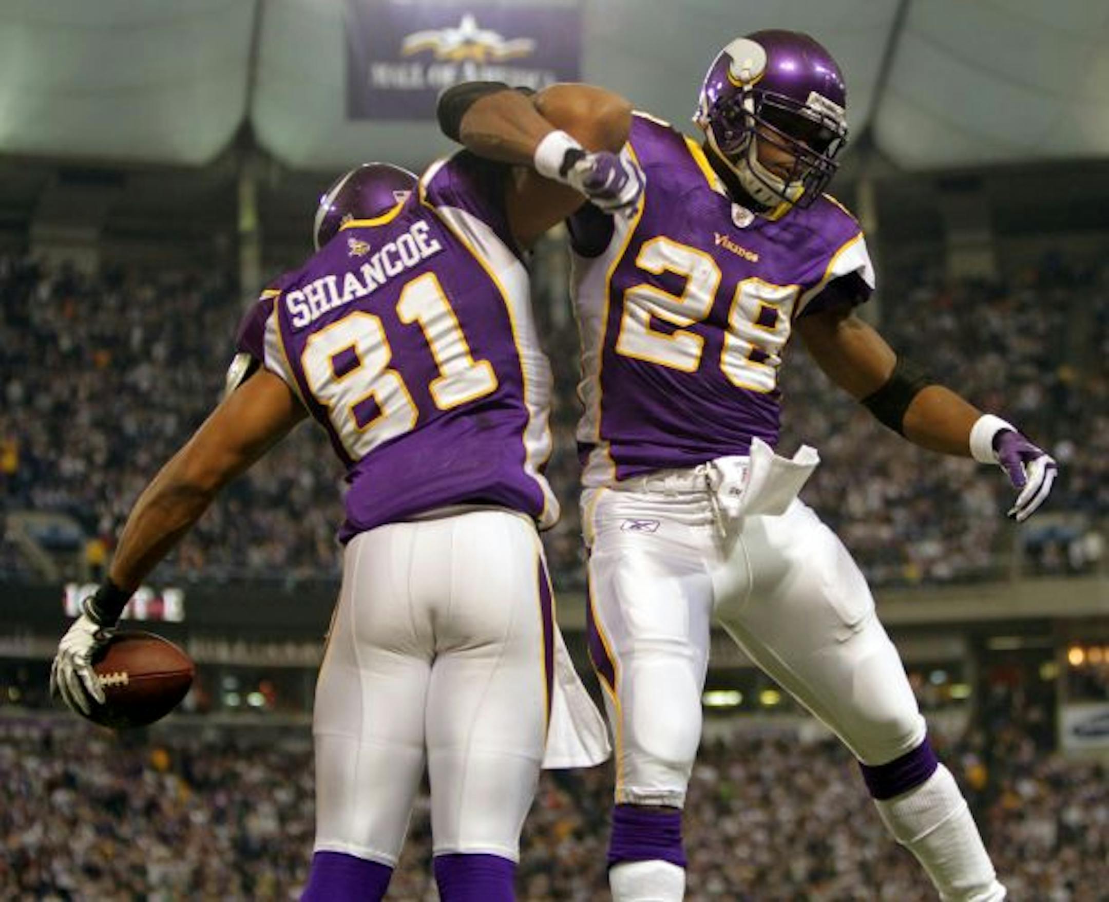 Visanthe Shiancoe and Adrian Peterson celebrated.