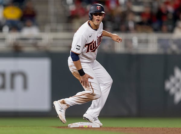 Alex Kirilloff stole second base during a Twins game in June 2021.