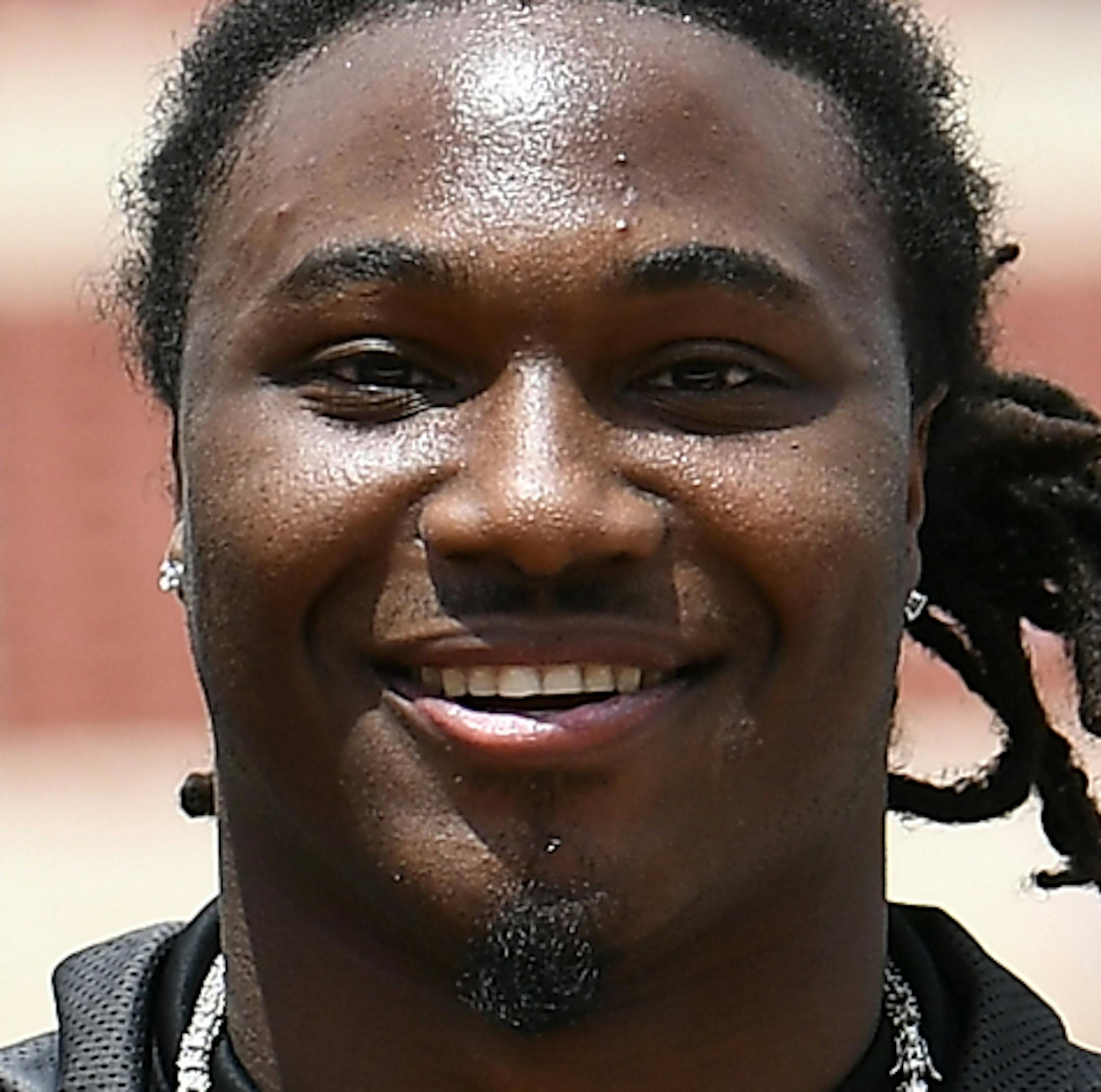 Former Texas Longhorn D'onta Foreman poses with his trophies during a spring NCAA football game. Saturday, April 15, 2017 in Austin, Tex. (TFV Media via AP) ** Mandatory Credit ** ORG XMIT: NYWWP