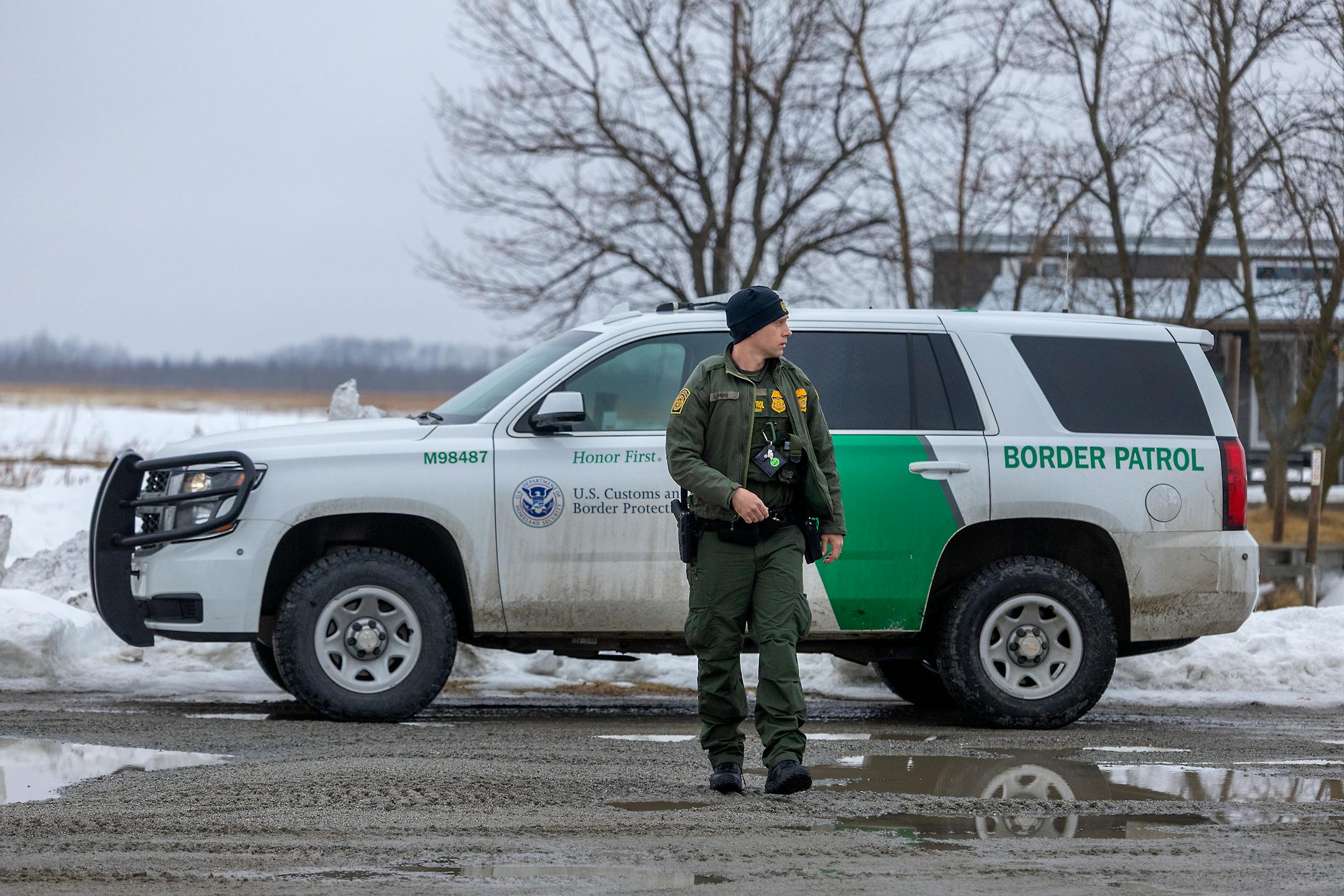Border Patrol Agent Jared Berg make his way onto Lake of the Woods in Warroad, Minn., on Tuesday, March 22, 2022.