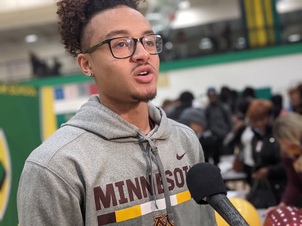 Park Center senior guard Braeden Carrington talks after signing with the Gophers on Wednesday at his high school gym.