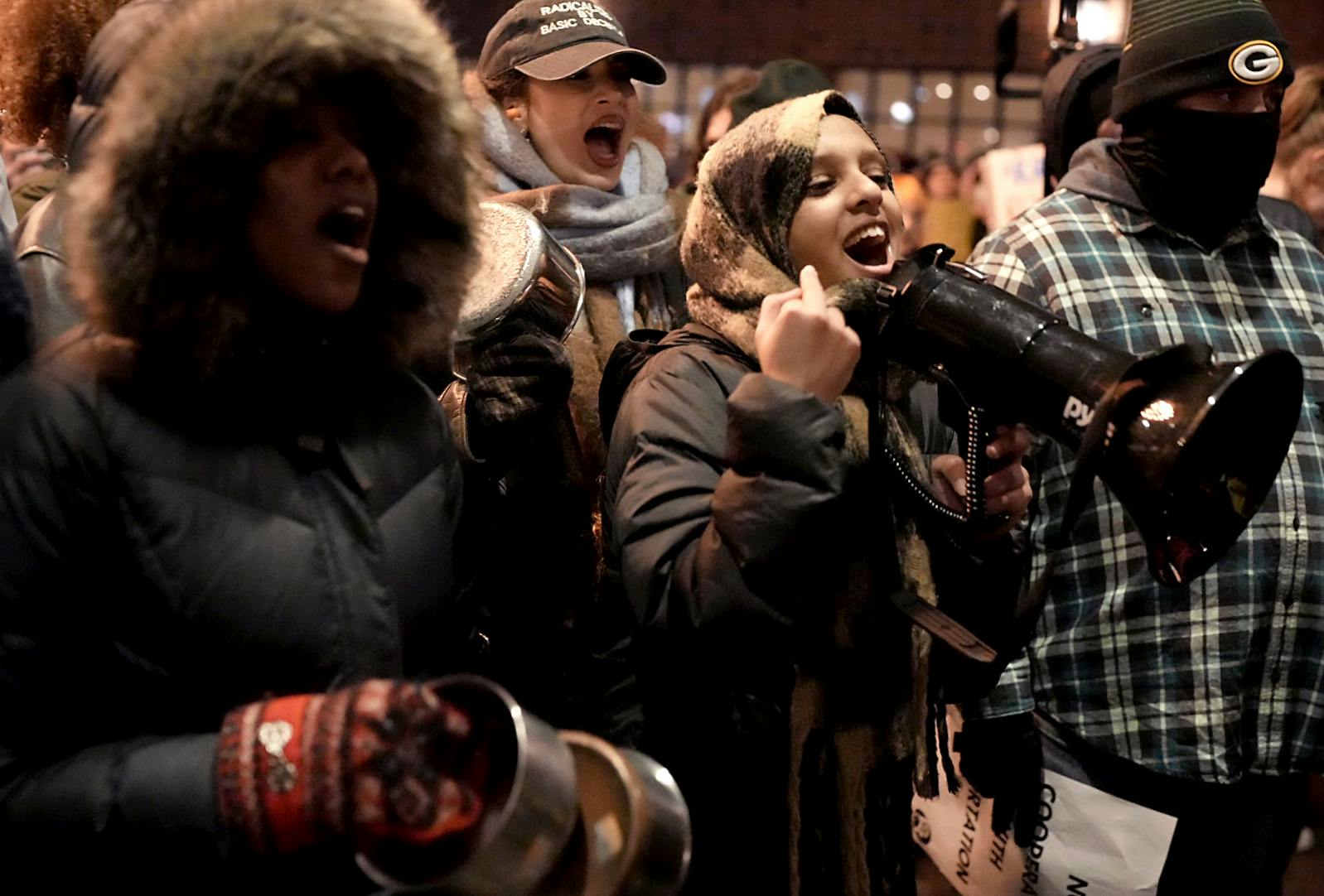 Demonstrators protest on Tuesday, Jan. 13, outside the Graduate by Hilton Minneapolis hotel, where ICE agents are believed to be staying.