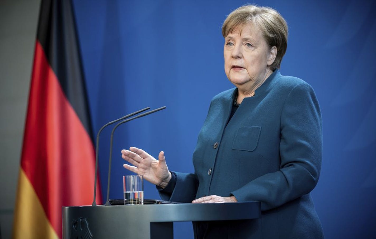 German Chancellor Angela Merkel speaks at a press conference about coronavirus, in Berlin, Sunday, March 22, 2020. German authorities have issued a ban on more than two people meeting outside of their homes, which they believe will be easier to follow than locking people in their homes. The vast majority of people recover from the new coronavirus. According to the World Health Organization, most people recover in about two to six weeks, depending on the severity of the illness.