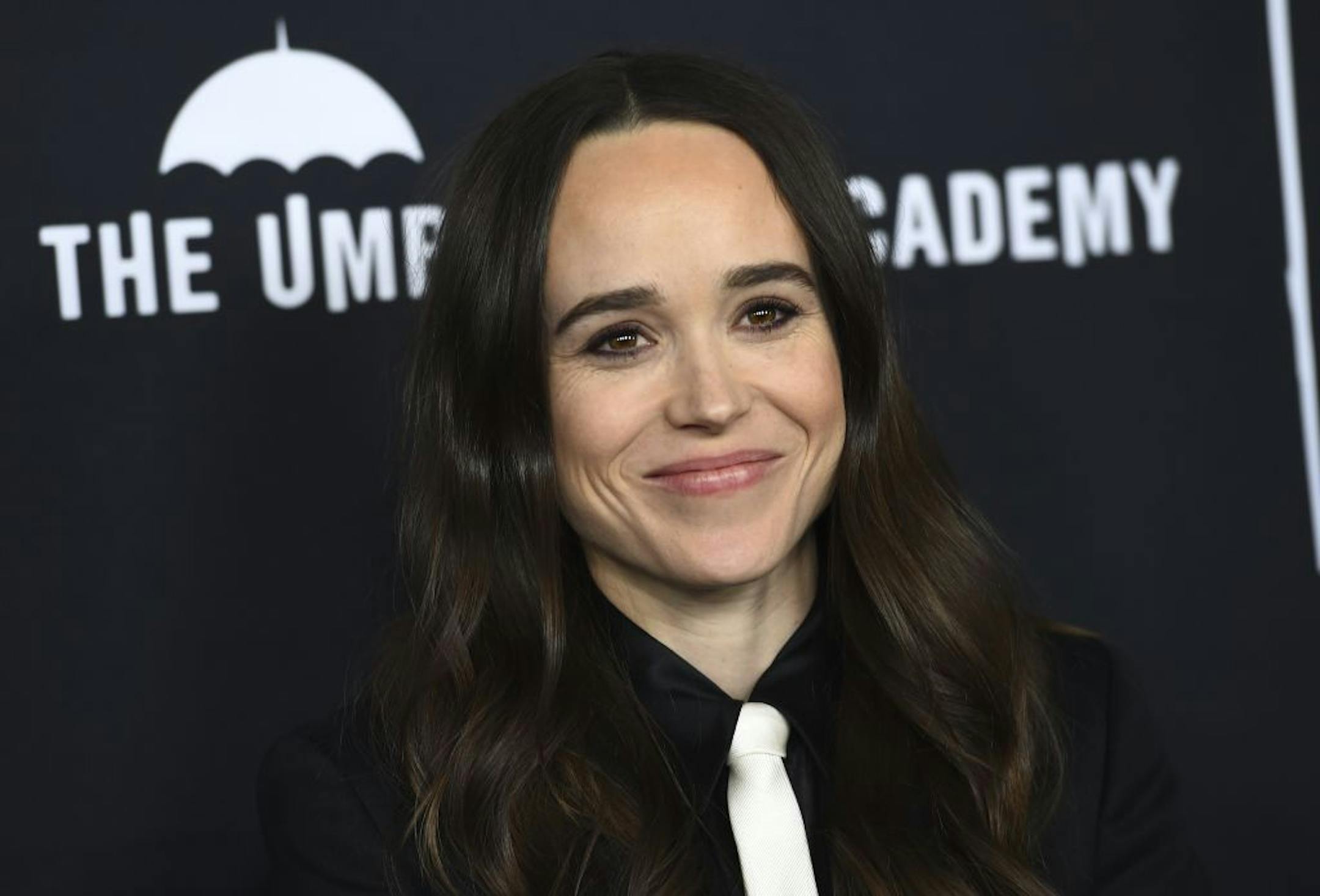 FILE - Elliot Page arrives at the Los Angeles premiere of "The Umbrella Academy" on Feb. 12, 2019. Page, the Oscar-nominated actor of "Juno", "Inception" and "The Umbrella Academy" came out as transgender on Tuesday in an announcement greeted as a watershed moment for the trans community in Hollywood.