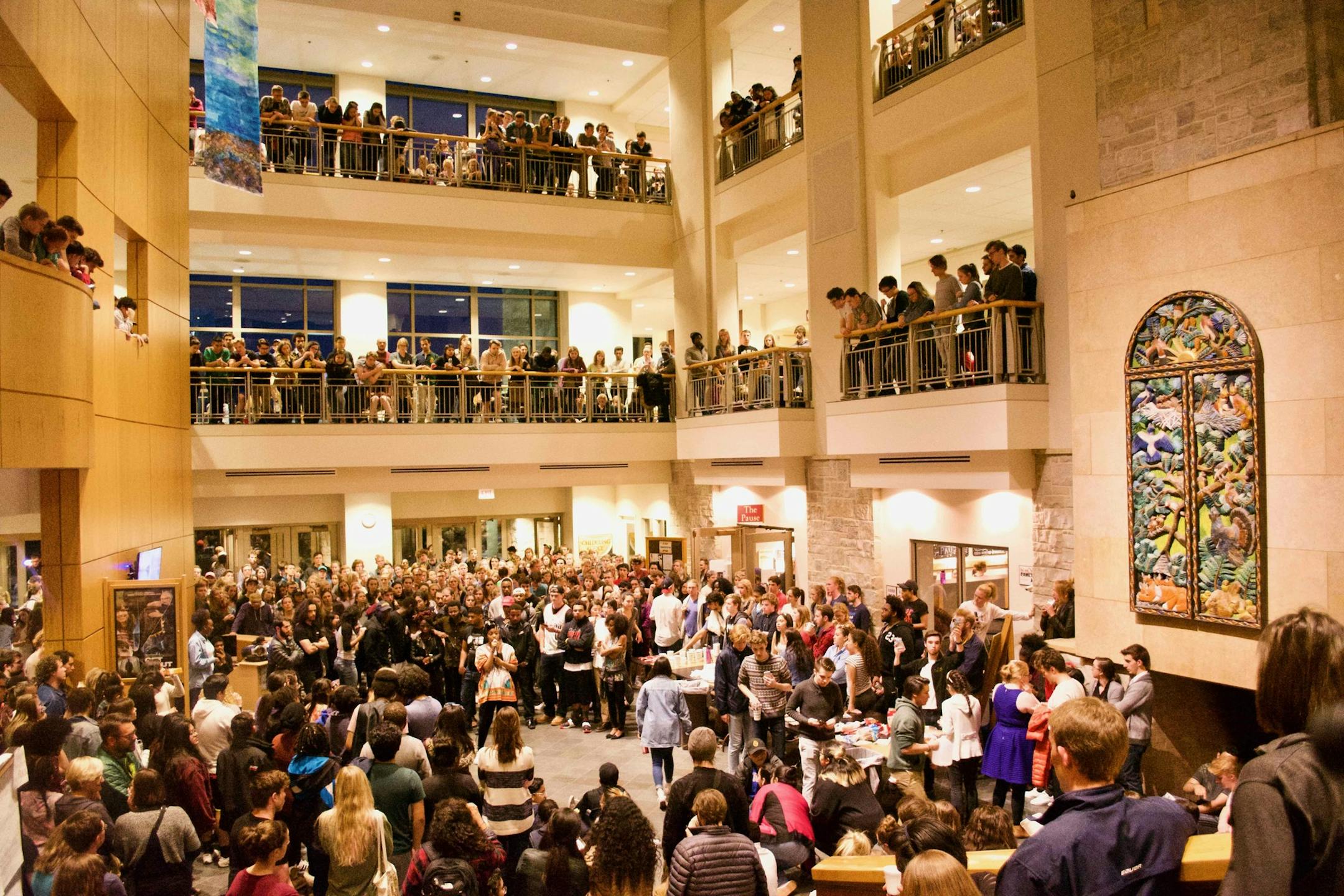 Protesters and others filled the commons area Saturday night at St. Olaf College.