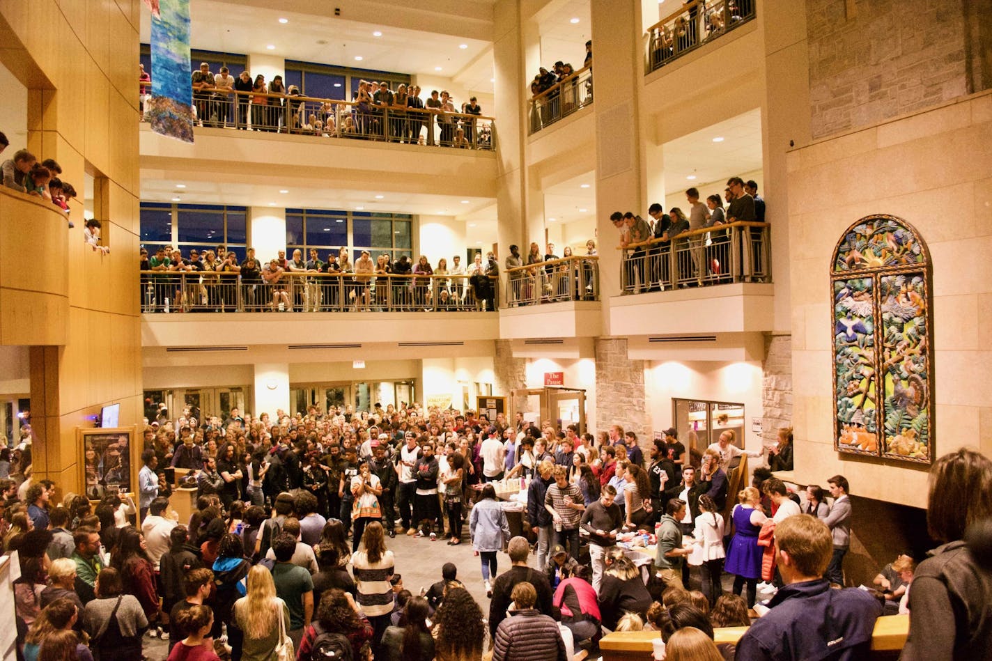 Protesters and others filled the commons area Saturday night at St. Olaf College.