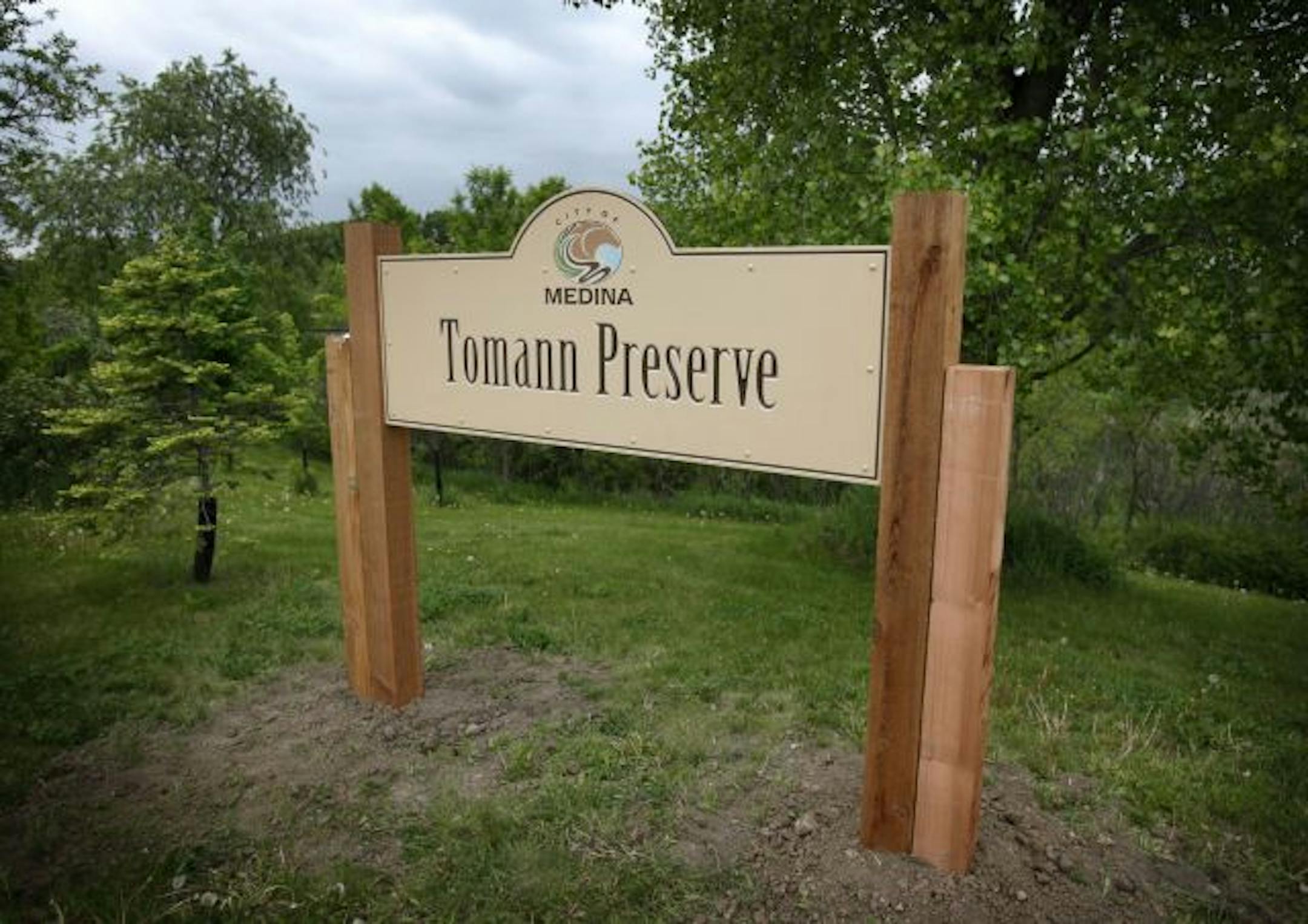 A new sign recognizes the preserve and the benefactors who made it possible. The 16-acre parcel was worth about $150,000.