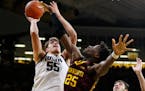 Iowa center Luka Garza, the Big Ten Player of the Year, will face Gophers center Daniel Oturu for the third time this season in the Big Ten tournament