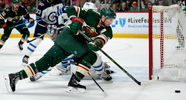 The Wild's Eric Staal chased the puck in the first period against the Jets during Game 4