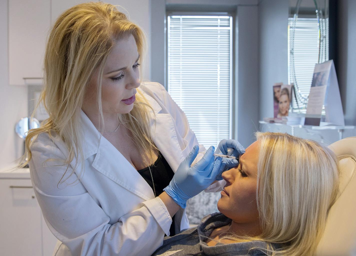 Daisha DeMike of St. Paul held got a Botox treatment from injection specialist Rebecca Suess Thursday. ] ANTHONY SOUFFLE &#x2022; anthony.souffle@startribune.com Daisha DeMike of St. Paul got a Botox treatment from injection specialist Rebecca Suess Thursday, Jan. 12, 2017 at Aesthetic Institute of Edina. Some millennials keen on preserving their youth are turning to Botox to smooth away hints of creases and wrinkles on their faces. Recent surveys report a surge in patients under 30 getting "pre