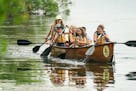 Third, fourth and fifth graders paddled canoes on Lake Marion, Lakeville, as part of Lakeville's summer "Launch into Learning" program. This group spo