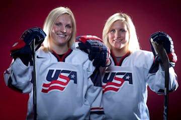 Jocelyne, left, and Monique Lamoureux at the 2013 media summit in Salt Lake City.