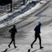 Two runners jogged along West River Parkway in sub-zero temperatures Saturday afternoon in Minneapolis. ] AARON LAVINSKY &#xef; aaron.lavinsky@startri