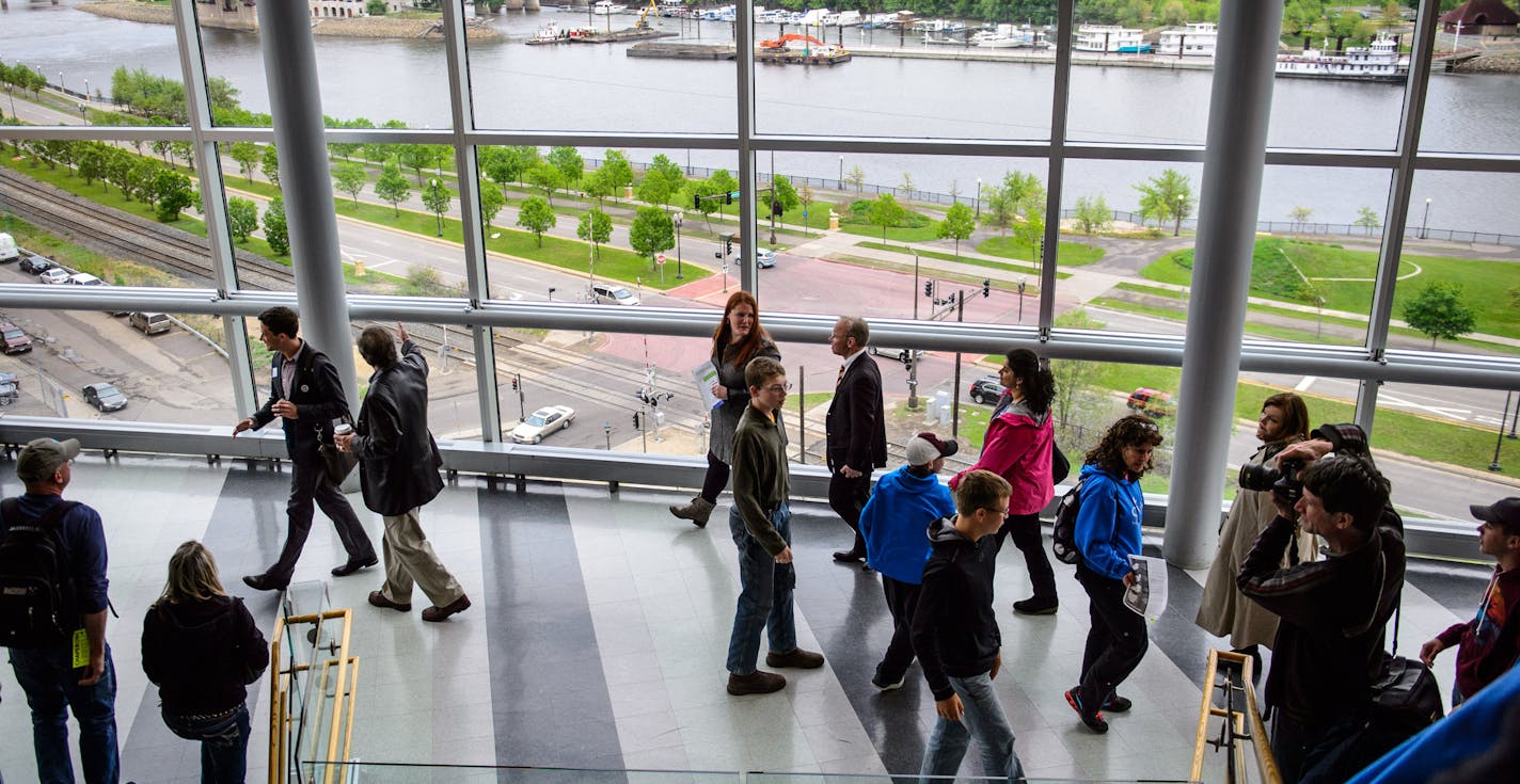 The start of the EcoDistrict walking tour at the Minnesota Science Museum. ] GLEN STUBBE * gstubbe@startribune.com Thursday, May 14, 2015 St. Paul and partners will officially launch the Saint Paul EcoDistrict at the Science Museum of Minnesota. The announcement will kick off Placemaking Residency, hosted by the Saint Paul Riverfront Corporation. The EcoDistrict focuses on sustainable development along the Mississippi riverfront; a walking tour followed the launch.