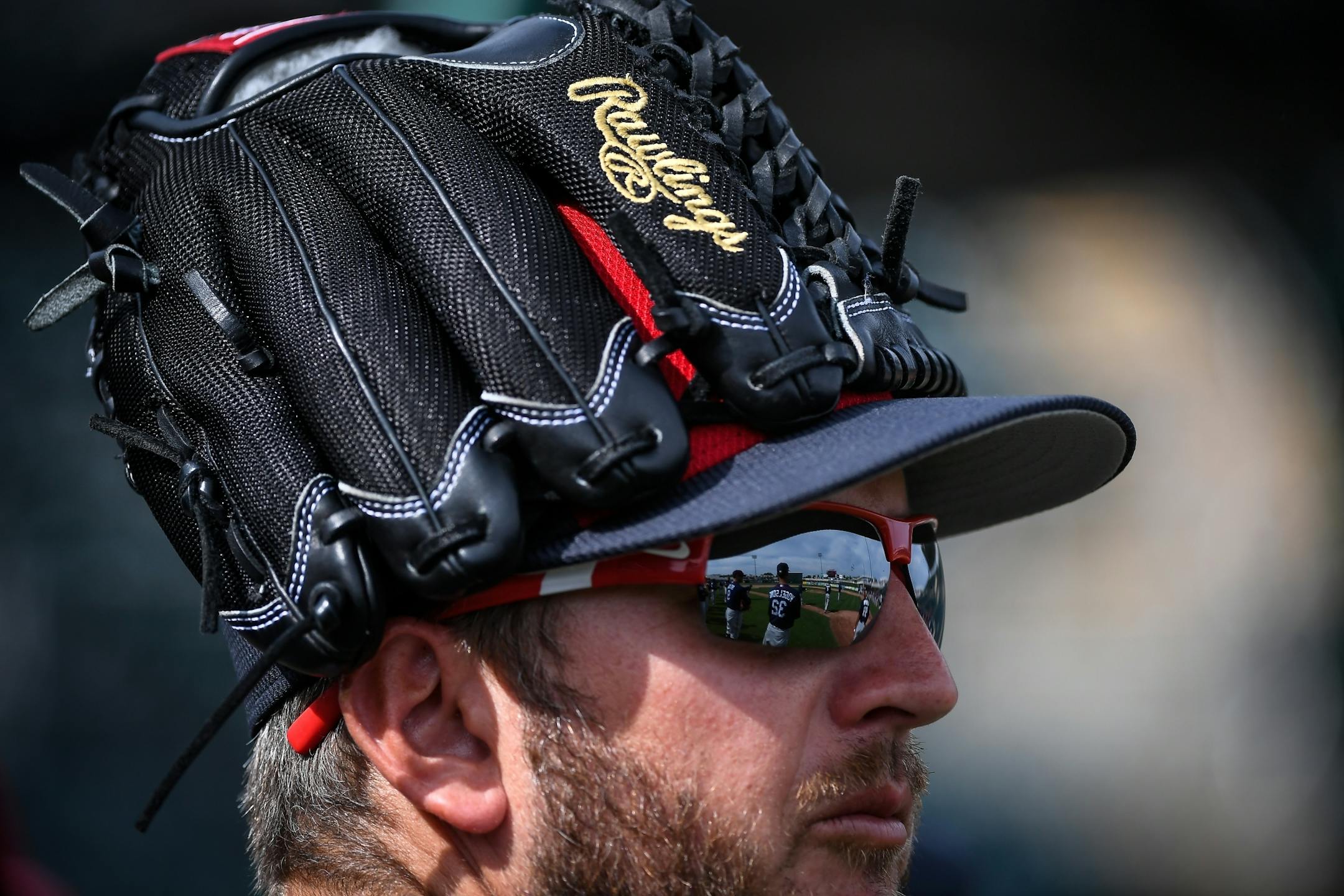 Twins pitcher Glen Perkins wore his glove on his head during practice Tuesday.