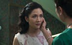 This image released by Warner Bros. Entertainment shows Constance Wu, left, and Michelle Yeoh in a scene from the film "Crazy Rich Asians." (Warner Br